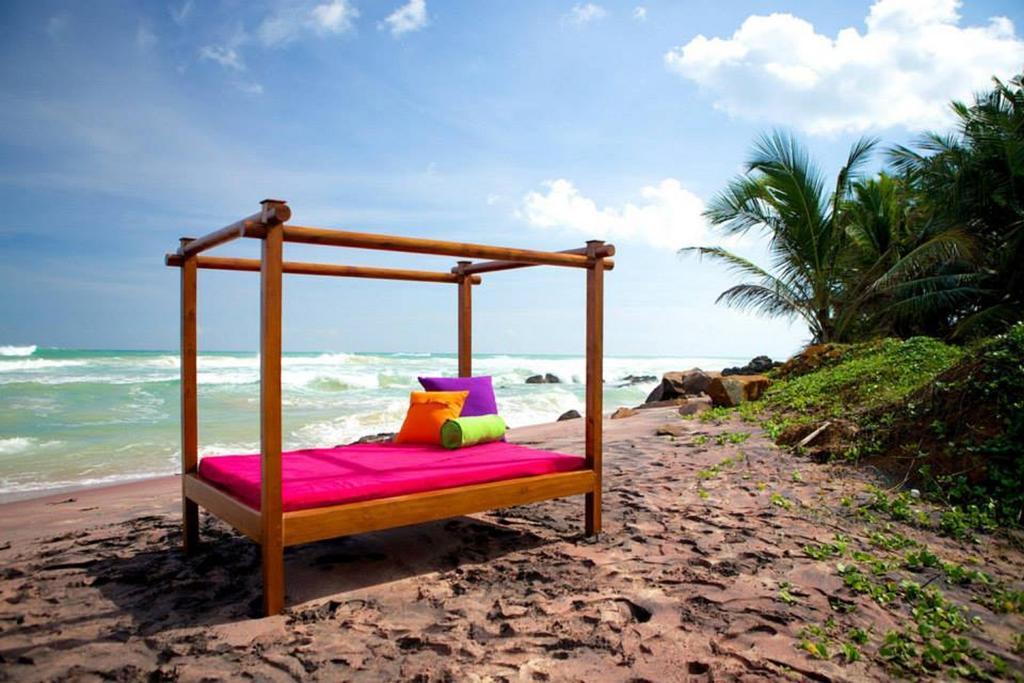 Utmt - Underneath The Mango Tree Spa & Beach Resort ديكويلاّ تين المظهر الخارجي الصورة